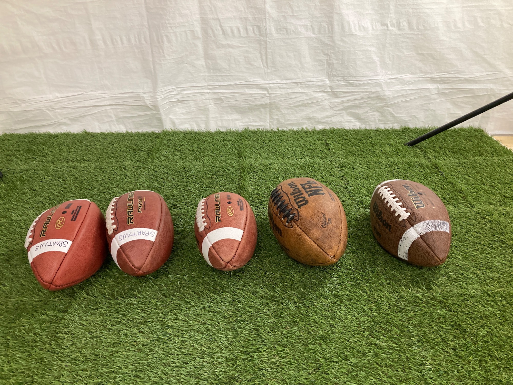 5 Used Footballs Various Sizes SidelineSwap