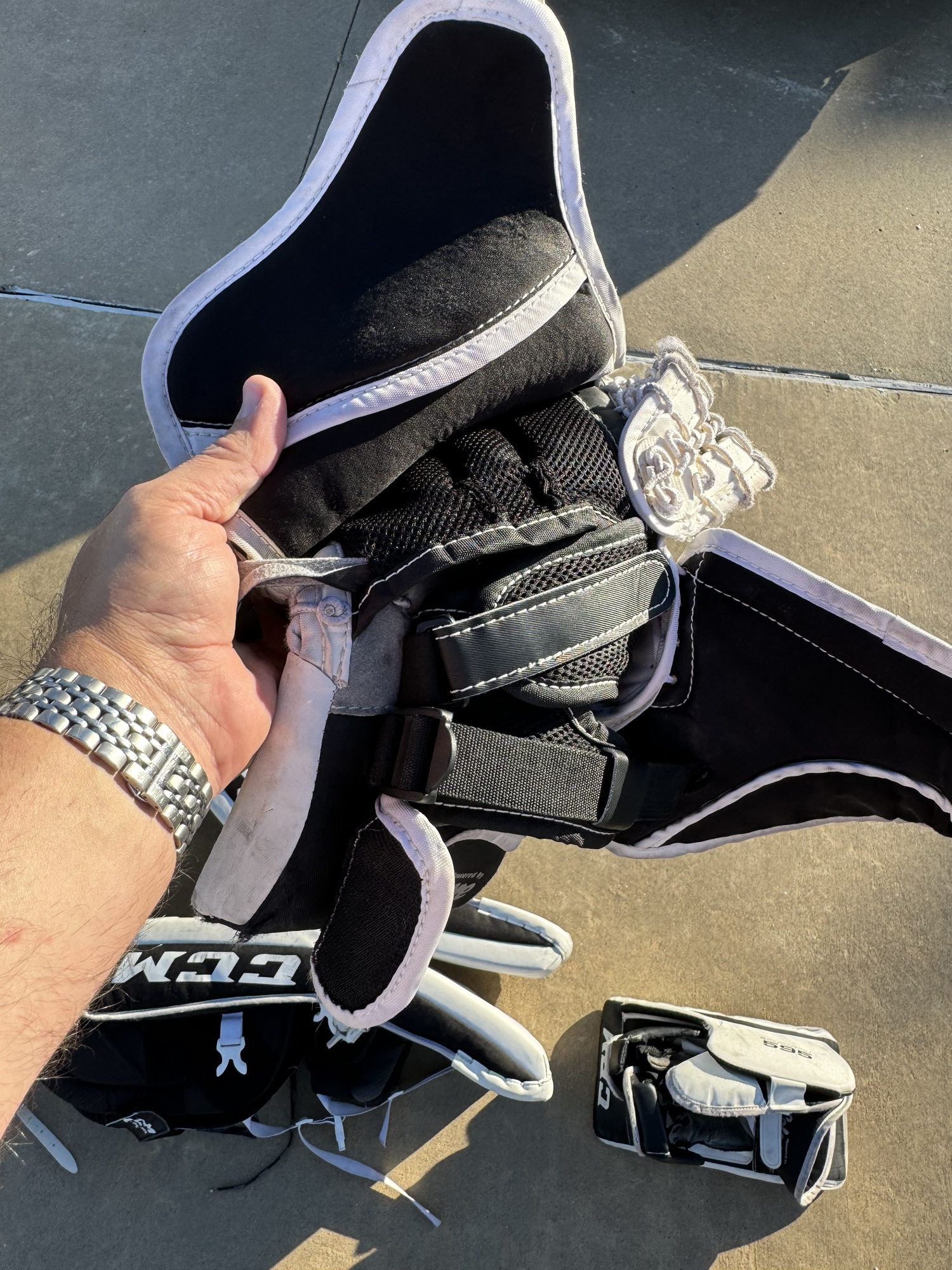 Used CCM Regular Junior 28+1 Revolution 595 Goalie Leg pads, glove and