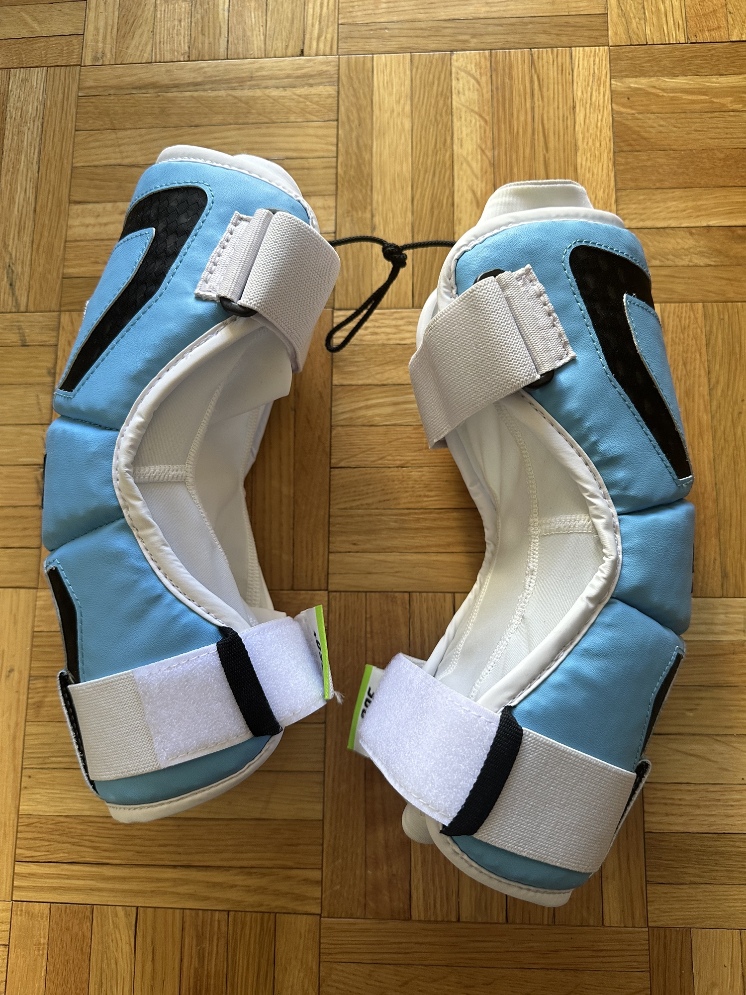 Brand new STX Cell V Lacrosse Arm Pads m/l. LIU team issued SidelineSwap