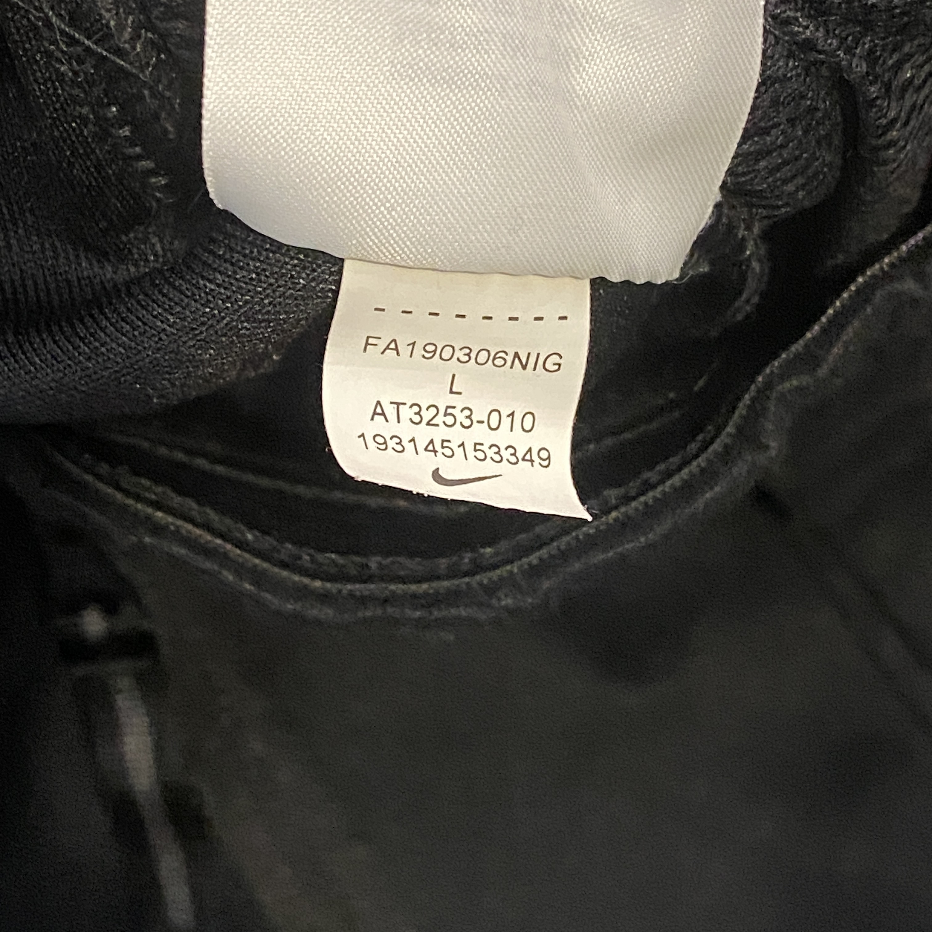 nike logo all over sweatpants